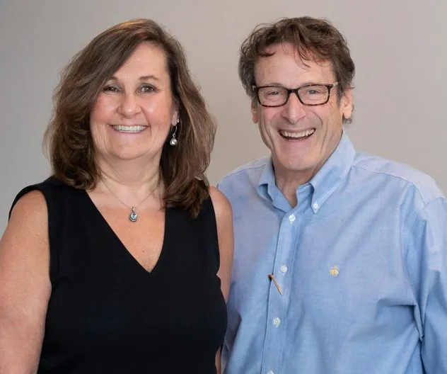 Mark Gianno with a colleague at Gianno & Freda
